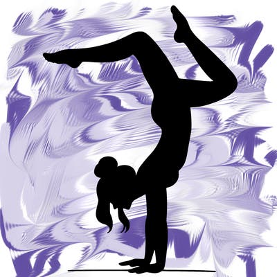 a woman doing a handstand