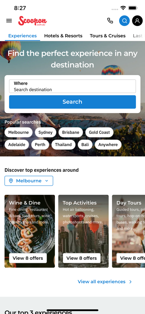 Scoopon mobile app home screen with a search bar and travel experience categories