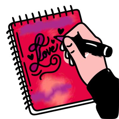 a hand writing “love” in calligraphy on a notebook