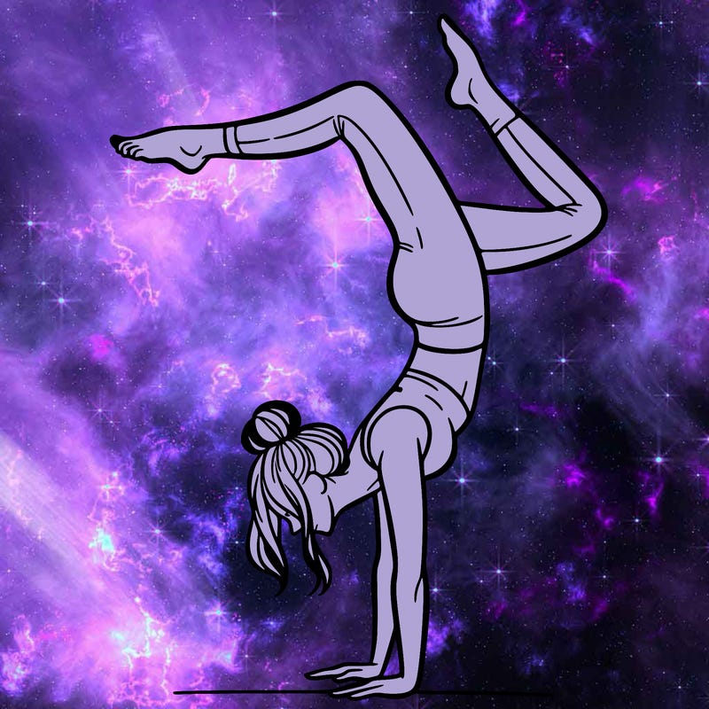 a woman doing a handstand