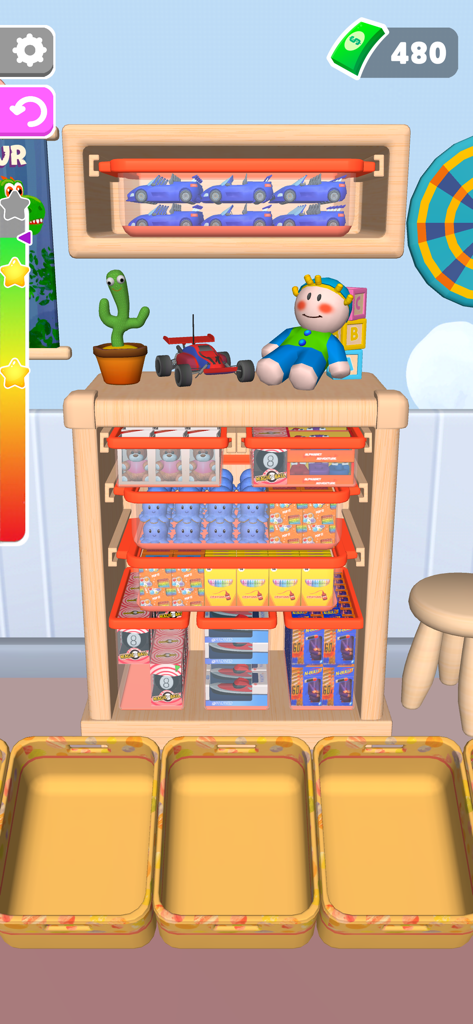 A satisfying puzzle level showing toy organization on a shelf within the Fill The Fridge app
