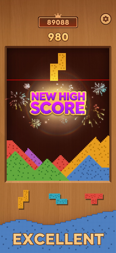 Sand Crush game screen displaying a new high score with fireworks and colorful sand piles