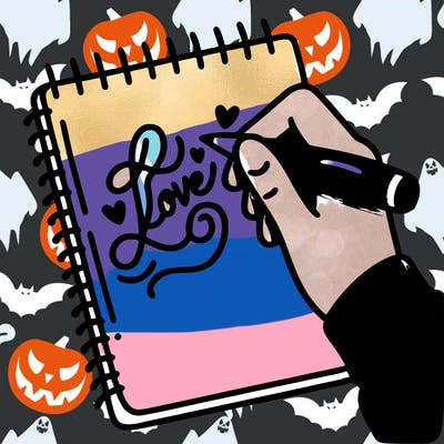 a hand writing “love” in calligraphy on a notebook