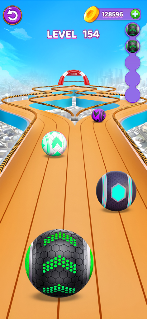 Bolas 3D de colores rodando sobre una pista elevada sobre un fondo de ciudad