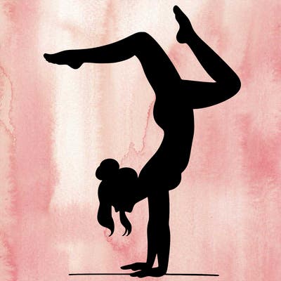 a woman doing a handstand