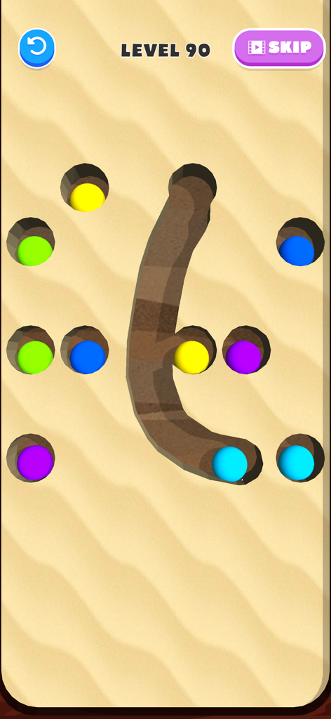 Brain Dig - Digging Puzzle - - Brain Dig gameplay showing colored balls and a path dug through sand in a physics-based puzzle level.