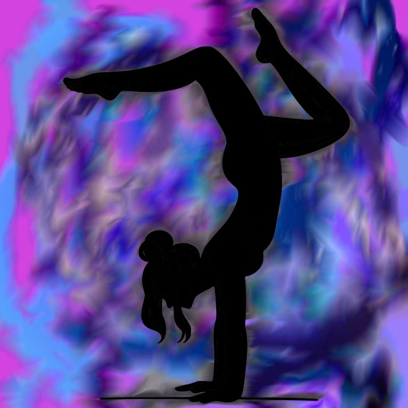 a woman doing a handstand