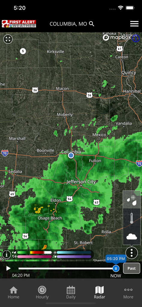 KOMU 8 Weather app radar screen showing rain precipitation over Columbia and Jefferson City Missouri