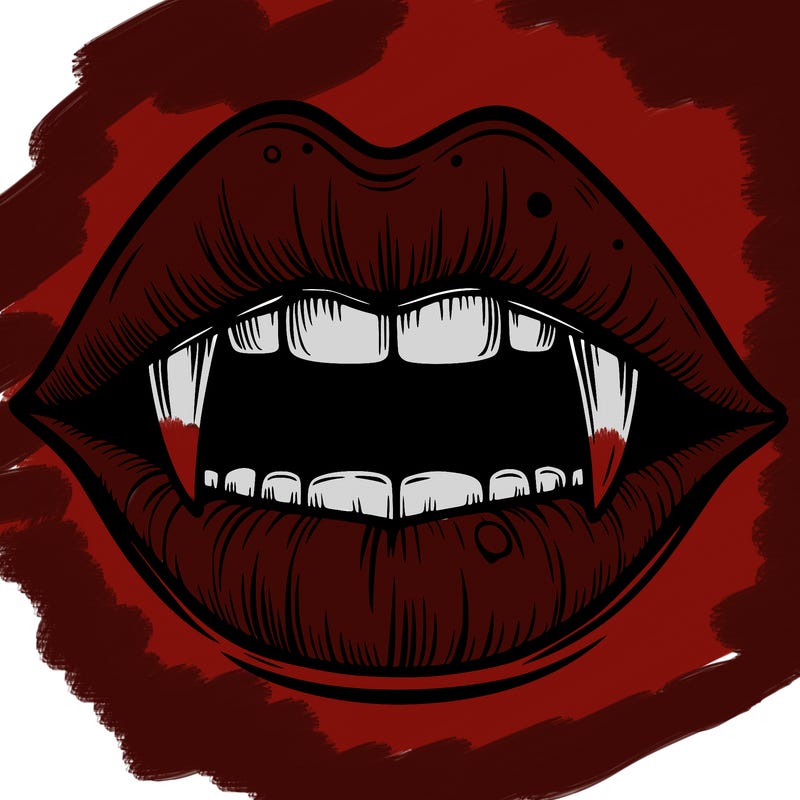 lips with vampire teeth