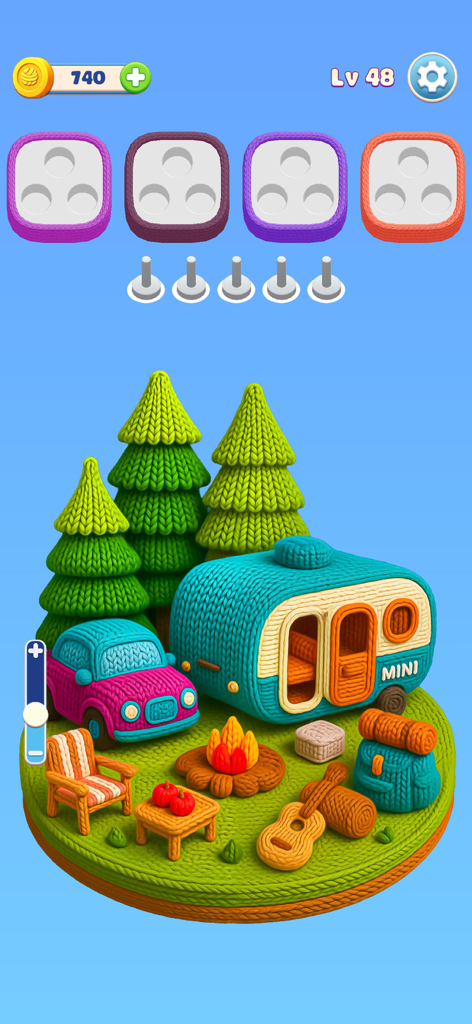Wool Frenzy - Yarn Match 3D - Una schermata di gioco puzzle 3D da Wool Frenzy che mostra una scena di campeggio fatta di filato lavorato a maglia, inclusi un furgone da campeggio color acqua e un'auto rosa.