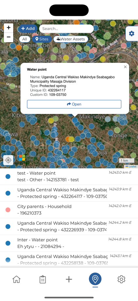 mWater Surveyor - Map view of mWater Surveyor app displaying colored markers for water points and a detailed information popup for a protected spring in Uganda
