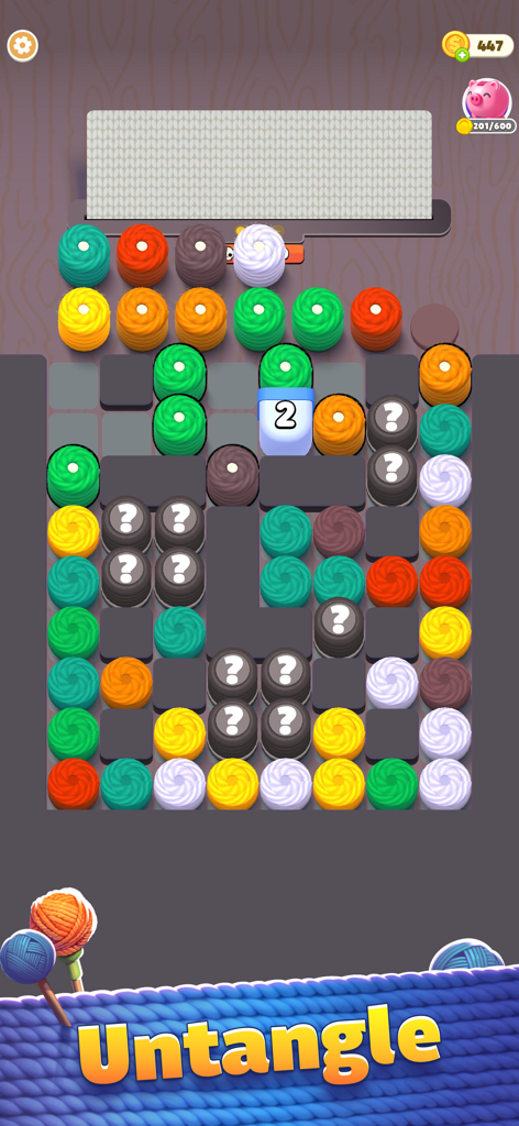 Thread Jam - Untangle 3D Ropes - Gameplay screen of Thread Jam showing colorful thread spools and a sorting puzzle.