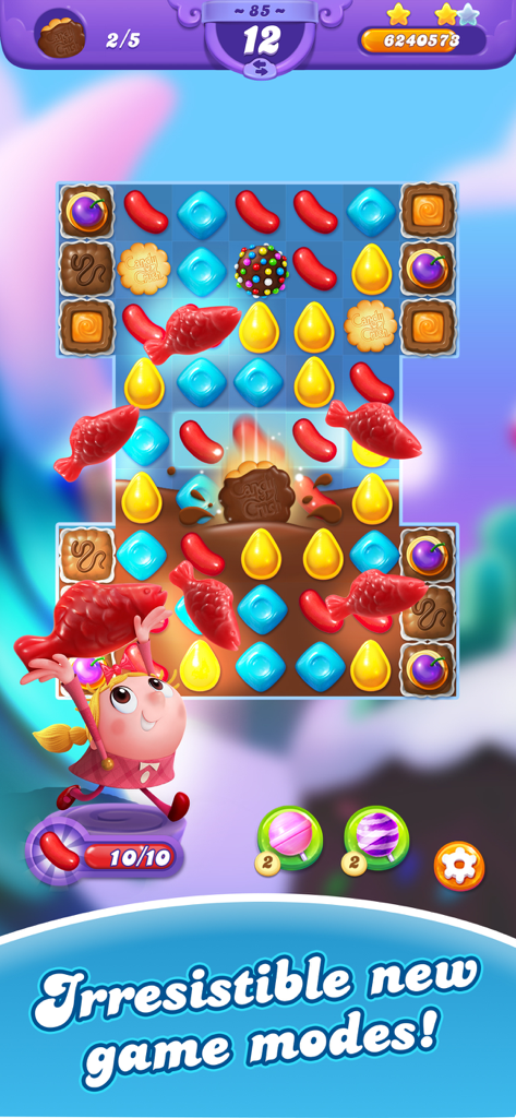 Captura de pantalla del juego Candy Crush Friends Saga mostrando a Tiffi usando potenciadores de peces rojos en un nivel de puzzle