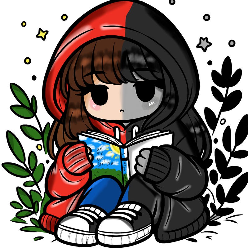 girl in oversized hoodie reading a book