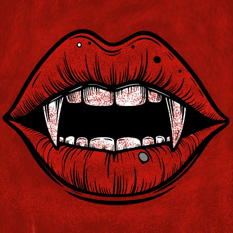 lips with vampire teeth