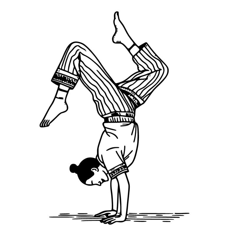 a woman doing a handstand