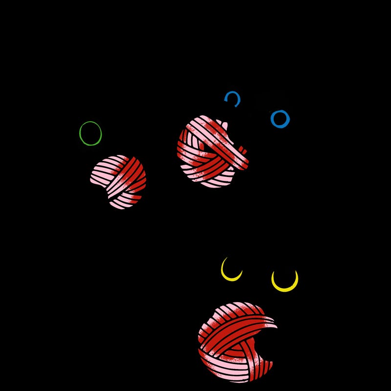 2 cute kittens playing with ball of yarn