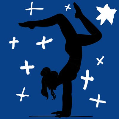 a woman doing a handstand