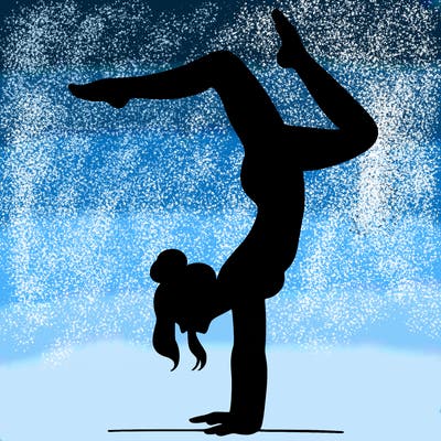 a woman doing a handstand