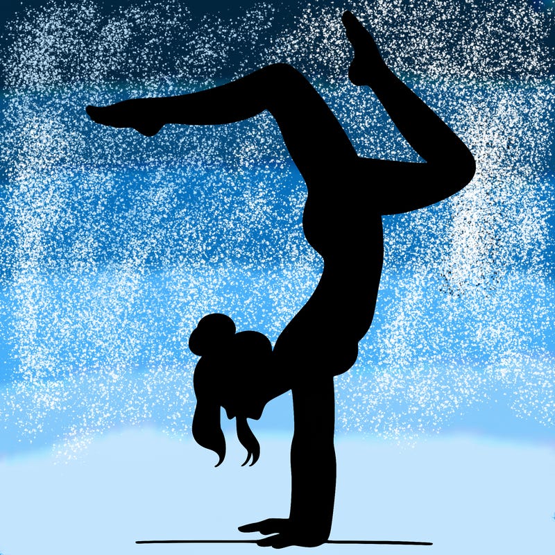 a woman doing a handstand
