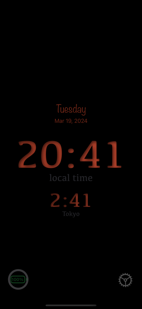 Always On Display - Interfaz de la aplicación Always On Display con un gran reloj digital con hora local y un reloj secundario para la zona horaria de Tokio
