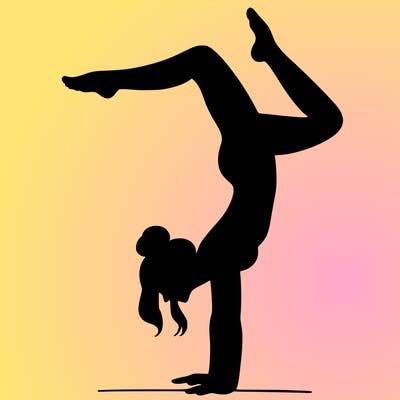 a woman doing a handstand