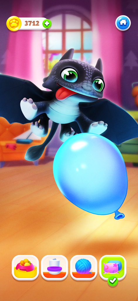 Un lindo dragón negro jugando con un globo azul en un juego de mascotas virtuales.