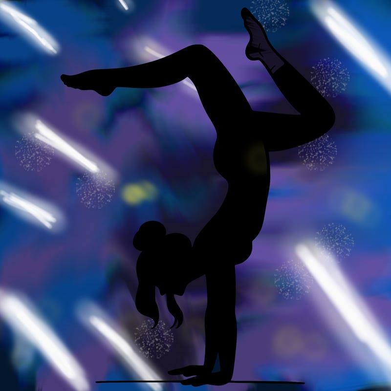 a woman doing a handstand