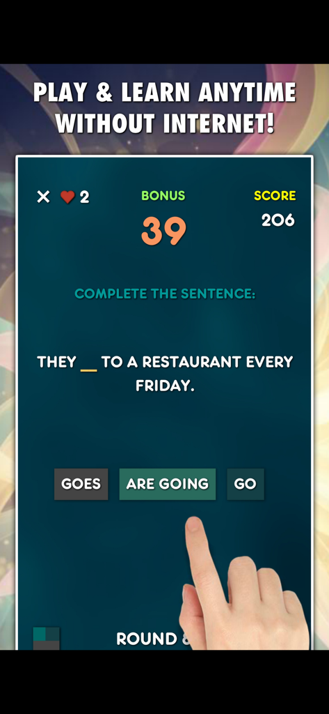 English grammar game interface showing a sentence completion task for present tenses practice