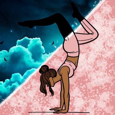 a woman doing a handstand