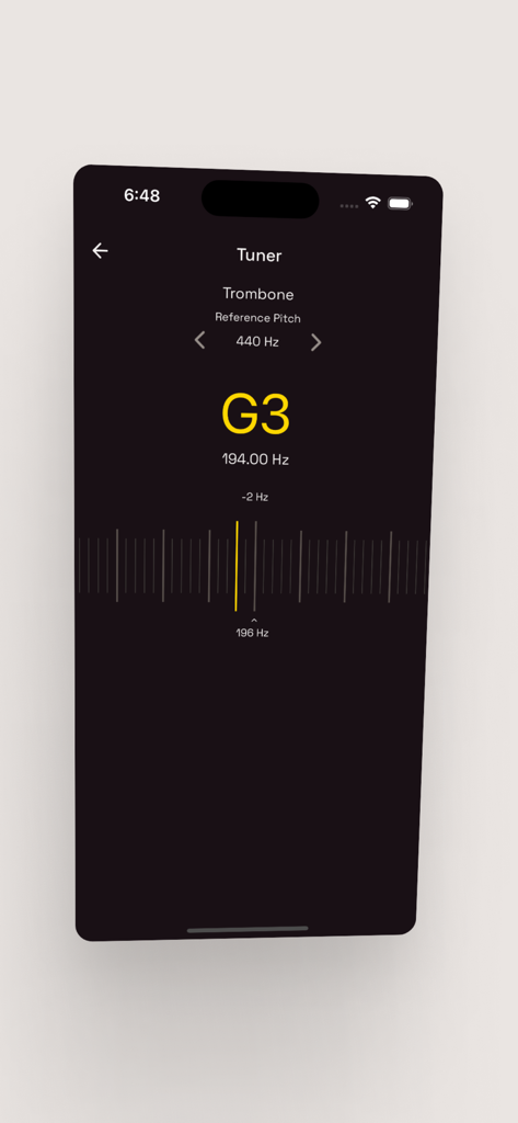 Virtual Trumpet & Trombone - A mobile app interface showing a digital tuner for a trombone instrument in dark mode