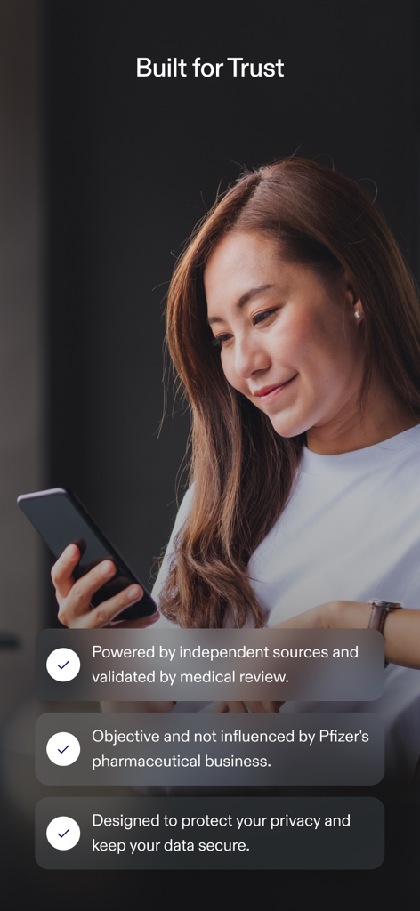 Health Answers by Pfizer - A woman using the Health Answers by Pfizer app with text highlighting built in trust medical review and data privacy