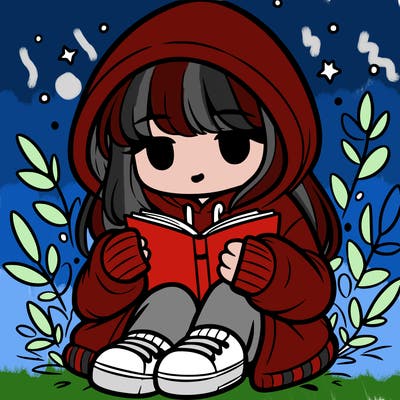 girl in oversized hoodie reading a book