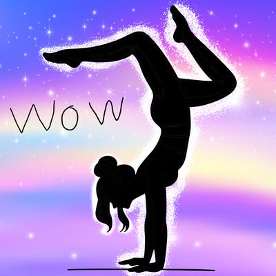 a woman doing a handstand