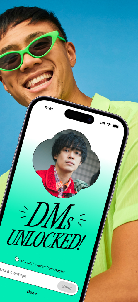 A smartphone showing a DMs Unlocked notification on the Yuzu Asian dating and social app