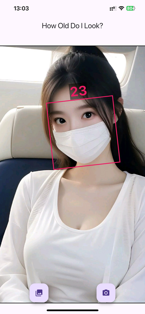 How Old Do I Look? Age Camera - AI age detector scanning a womans face and showing the result as 23