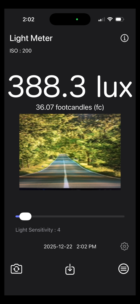 Light Meter - Brightness Calc - Light Meter app interface displaying real-time brightness measurements in lux and foot-candles with a landscape scene image.