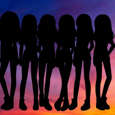 a group of girls wearing crop tops and shorts