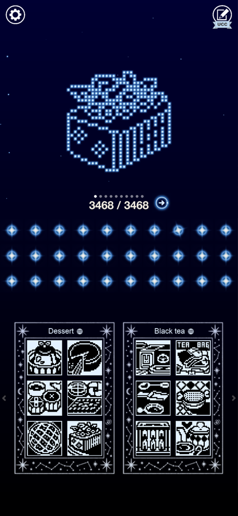 Nonogram galaxy 2 - Thema - Schermata di selezione puzzle che mostra temi completati di dessert e tè nero in un'interfaccia spaziale al neon.