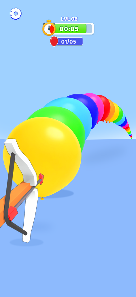 Colorful rainbow balloons being popped in a Crazy Challenge mini game level