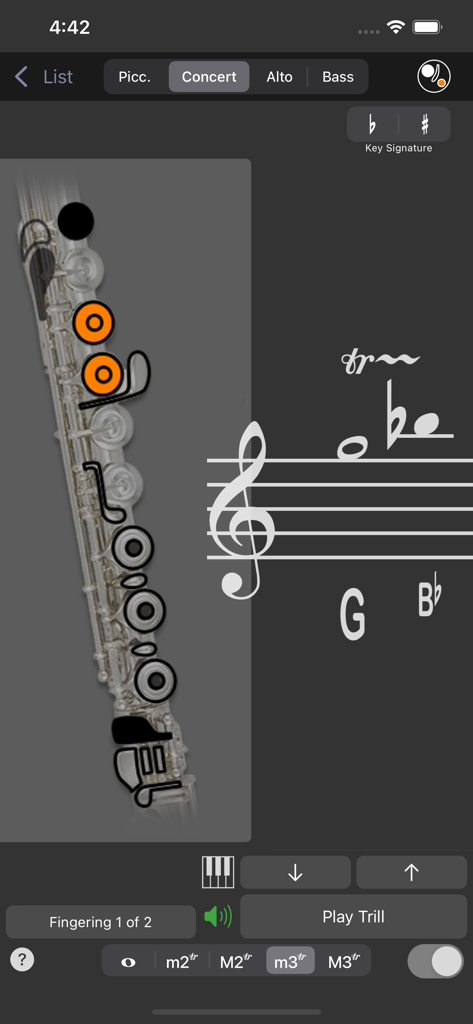 Fingering Woodwinds for iPhone - A screenshot of the Fingering Woodwinds app showing a flute fingering chart with orange indicators for a G to B flat trill on a musical staff.