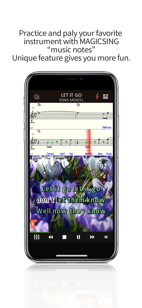 Smartphone screen displaying musical notes and karaoke lyrics for Let It Go in the Magicsing app