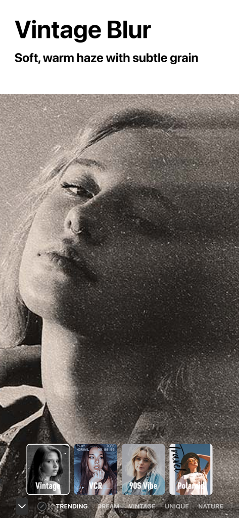 A portrait photo with a vintage blur effect, soft warm haze, and subtle grain from the Filto app interface.