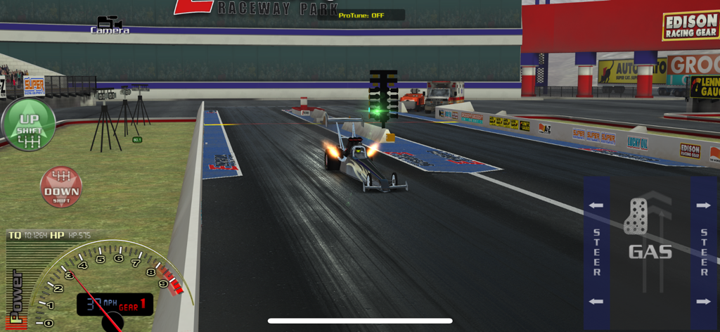 In-game view of a top fuel dragster launching on a drag strip with realistic controls and tachometer in EV3.
