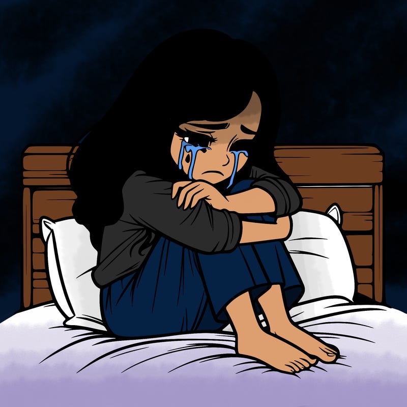 realistic girl crying on her bed over a break up