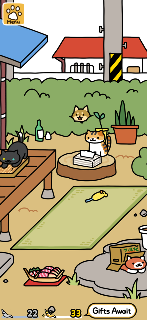 Neko Atsume 2 - A peaceful backyard scene in Neko Atsume 2 featuring cute cats and interactive toys