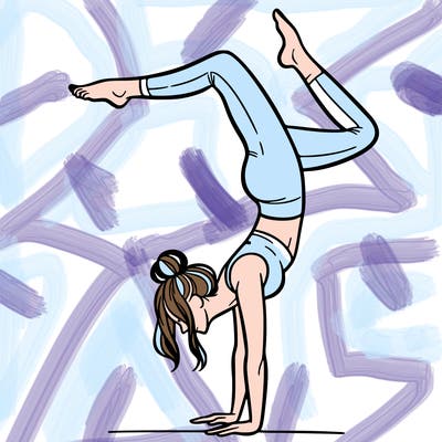 a woman doing a handstand