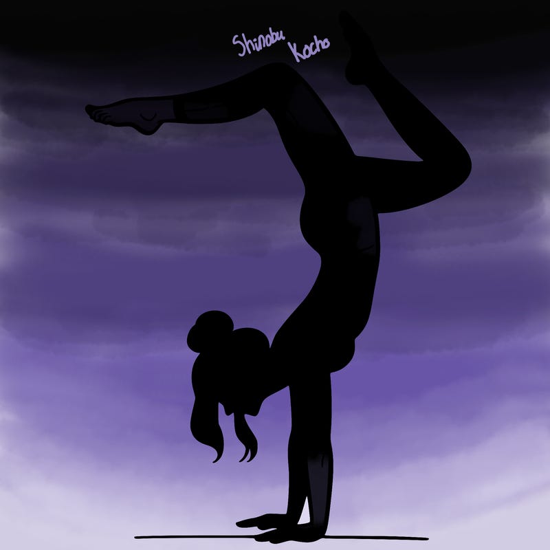 a woman doing a handstand