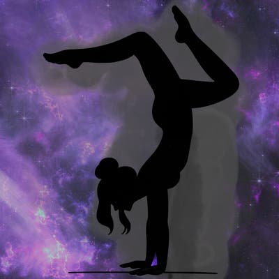 a woman doing a handstand