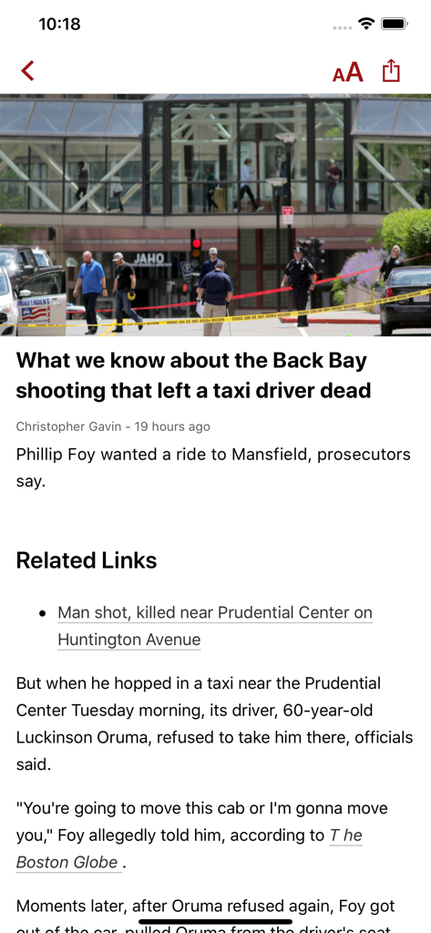Um artigo de notícias no aplicativo Boston.com sobre um tiroteio em Back Bay.